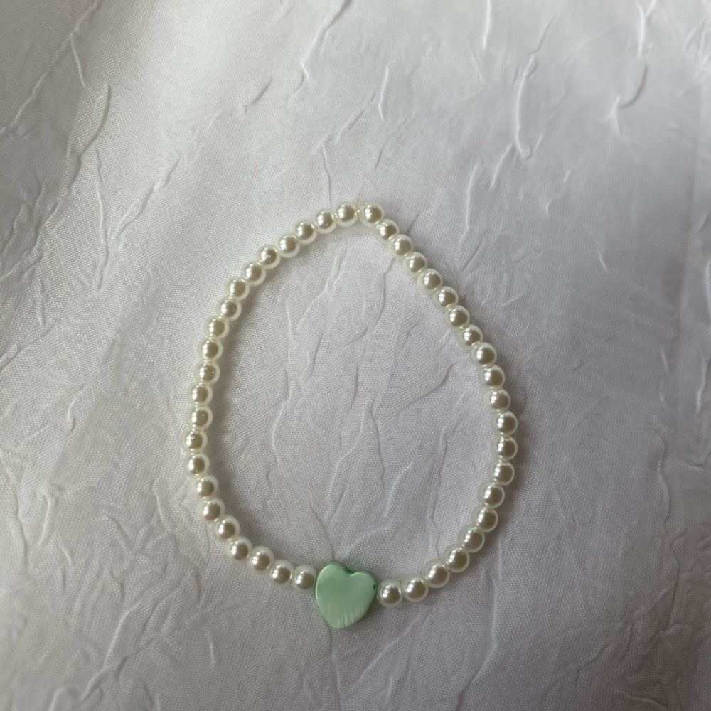 Elegant Pearl Bracelet with Green Heart Charm